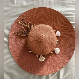 Tan sun hat. Neutral colors match everything.